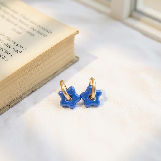 Boucle d'oreille en acier inoxydables et pierre bleu nuit