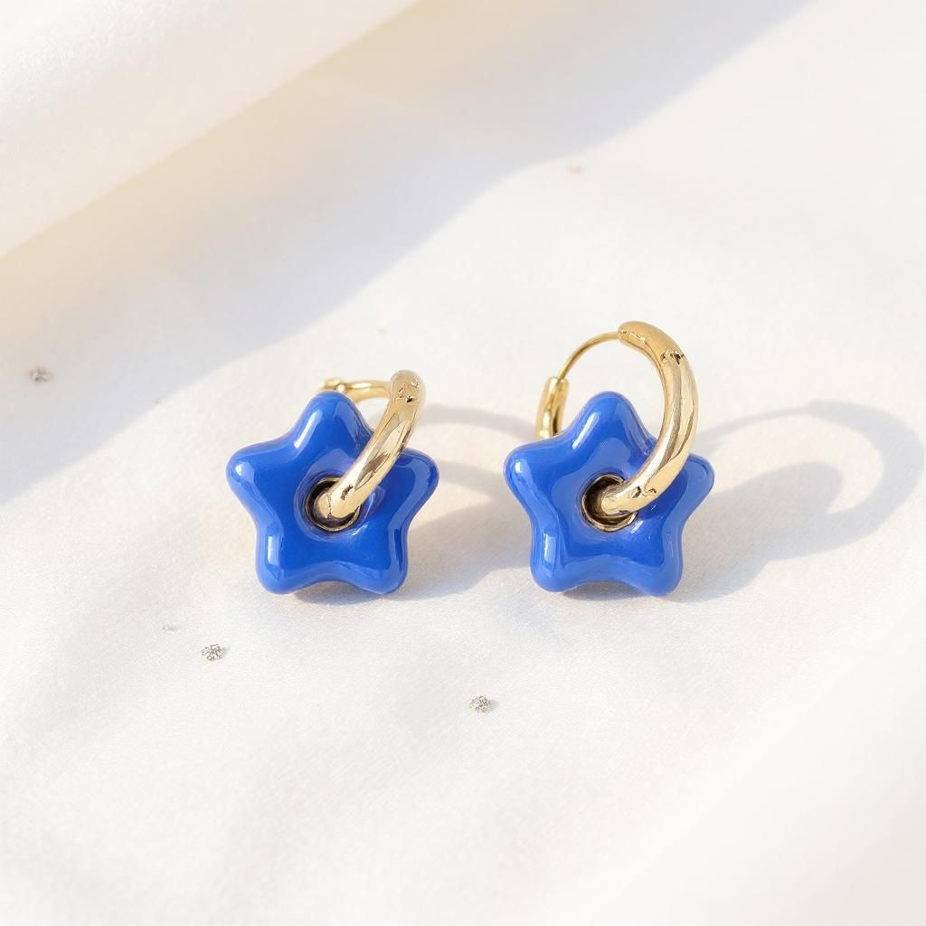 Boucle d'oreille en acier inoxydables et pierre bleu nuit
