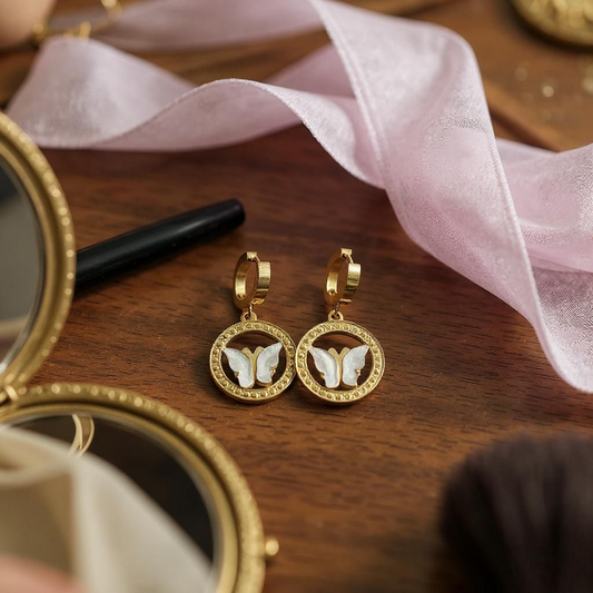 Boucle d'oreille papillon acier inoxydables